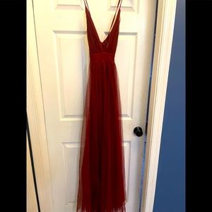Deep dark red princess gown.
